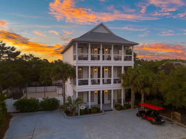 Luxury vacation rental "Sea It All" in Seagrove Beach, Florida featuring a private pool, spacious balconies with Gulf views, and upscale coastal decor.